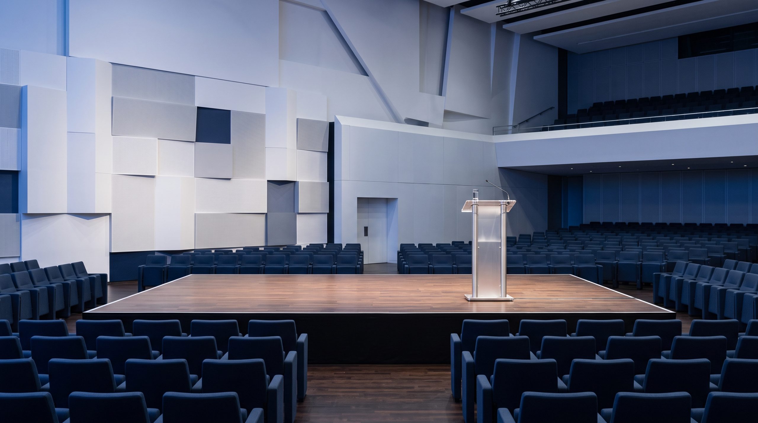 A conceptual view of a political conference stage with a lectern.
